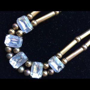Double strand necklace with clear stone